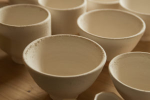 Glazed pots before they are placed in the kiln