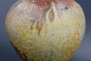 Small vase, fired lying, blue glaze drop on the rim
