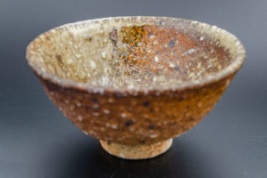 Sencha bowl, stone inclusions, ash deposit